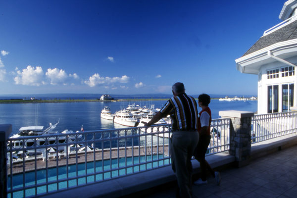 A Couple Overlooks Bay Harbor Lake in BHYC's Early Days